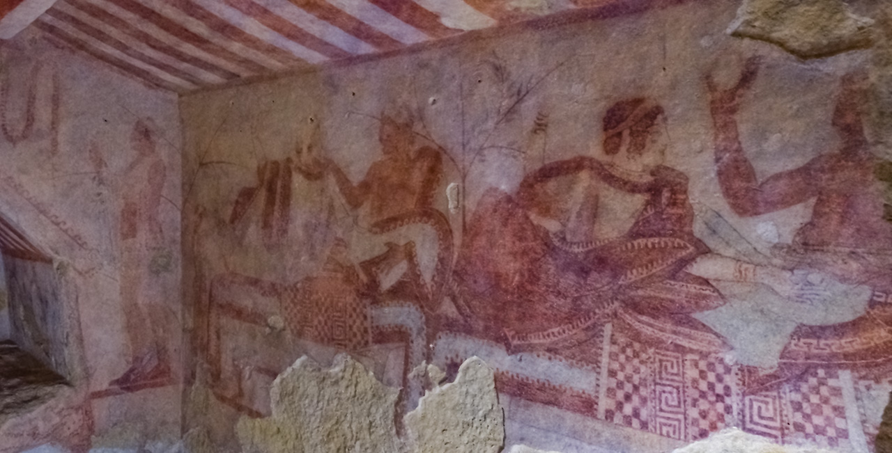 Etruscan frescoes in Monterozzi Necropolis in Tarquinia day trips from Rome to ancient wonders